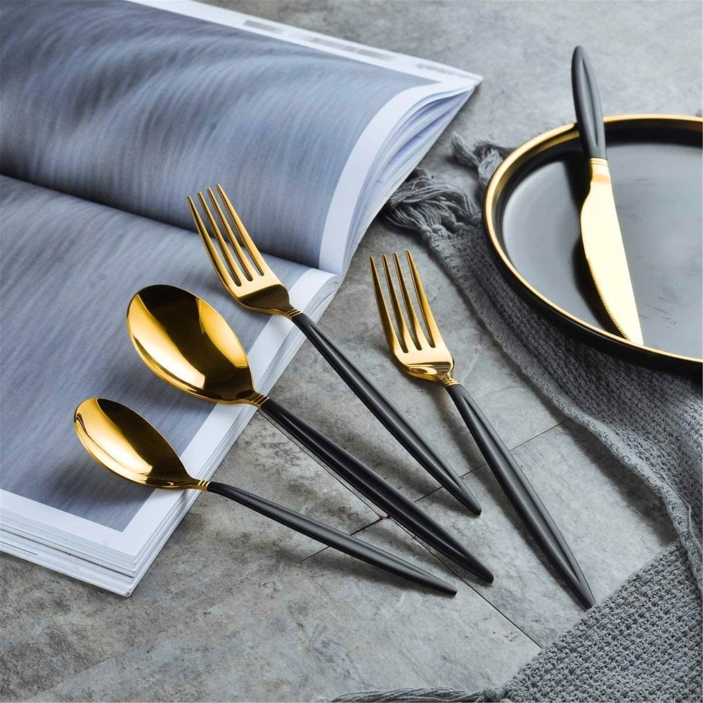 https://www.marvinsemporium.com/cdn/shop/products/20-Piece-Black-Gold-Flatware-Set_2C-Stainless-Steel-Silverware-Set_2C-Titanium-Gold-Spoon-and-Spray-Paint-Handle-Cutlery-Set.jpg?v=1619322435